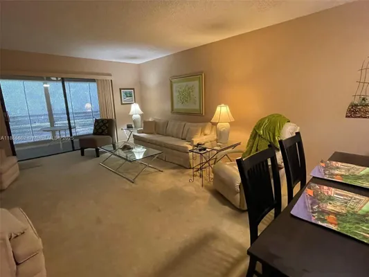 Property Slideshow image 2 of 33 | 4975 e sabal palm blvd 208, Tamarac, FL, 33319