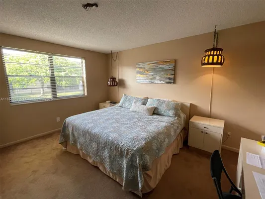 Property Slideshow image 3 of 33 | 4975 e sabal palm blvd 208, Tamarac, FL, 33319