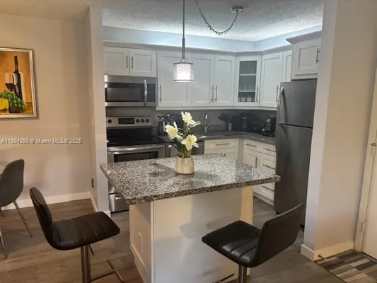 Property Slideshow image 3 of 11 | 10709 w clairmont cir 111, Tamarac, FL, 33321