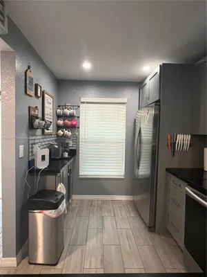 Property Slideshow image 3 of 19 | 5830 nw 64th ave apt 103, Tamarac, FL, 33319