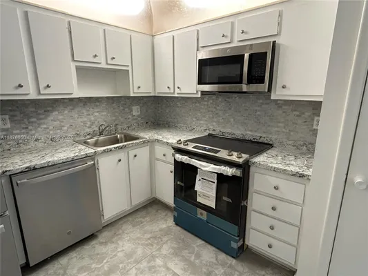 Property Slideshow image 2 of 17 | 2061 nw 47th ter 212, Lauderhill, FL, 33313