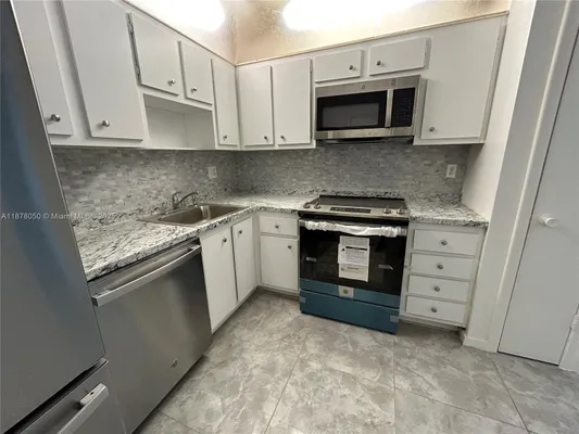 Property Slideshow image 3 of 17 | 2061 nw 47th ter 212, Lauderhill, FL, 33313