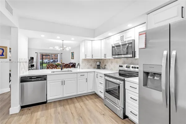 Property Slideshow image 2 of 25 | 701 sw 142nd ave 108s, Pembroke Pines, FL, 33027