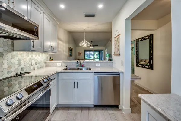 Property Slideshow image 2 of 24 | 16541 bayleaf ln 56, Fort Myers, FL, 33908