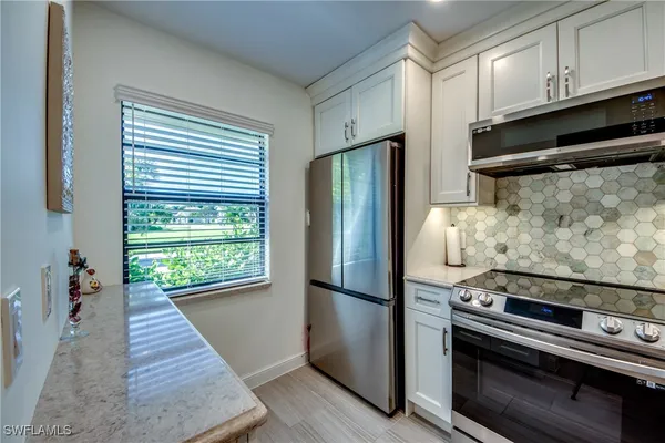 Property Slideshow image 3 of 24 | 16541 bayleaf ln 56, Fort Myers, FL, 33908