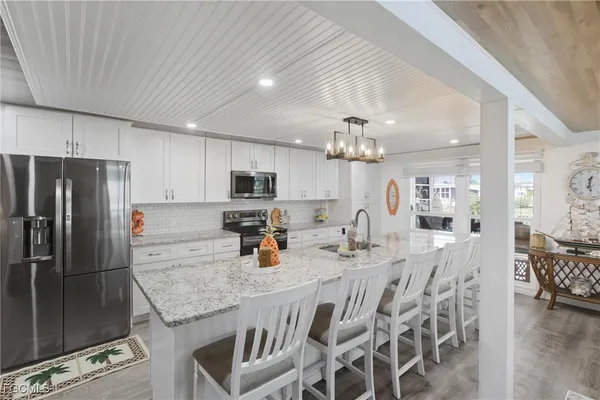 Property Slideshow image 2 of 48 | 5517 sir walter way, North Fort Myers, FL, 33917