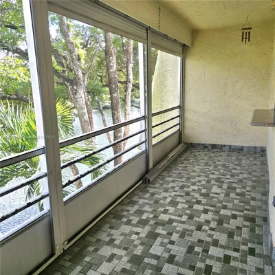 Property Slideshow image 2 of 31 | 9070 lime bay blvd 301, Tamarac, FL, 33321