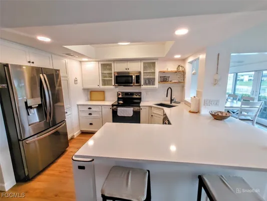 Property Slideshow image 2 of 39 | 5830 trailwinds dr 813, Fort Myers, FL, 33907