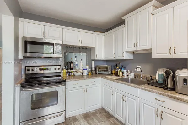 Property Slideshow image 2 of 13 | 6300 nw 62nd st 210, Tamarac, FL, 33319