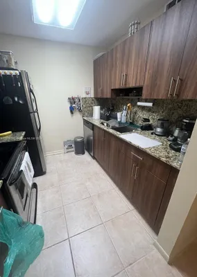 Property Slideshow image 2 of 8 | 1551 sw 135th ter 107g, Pembroke Pines, FL, 33027