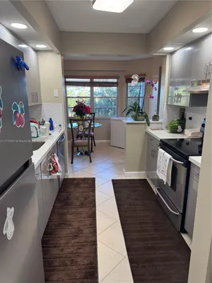 Property Slideshow image 2 of 47 | 12650 sw 6th st 411k, Pembroke Pines, FL, 33027