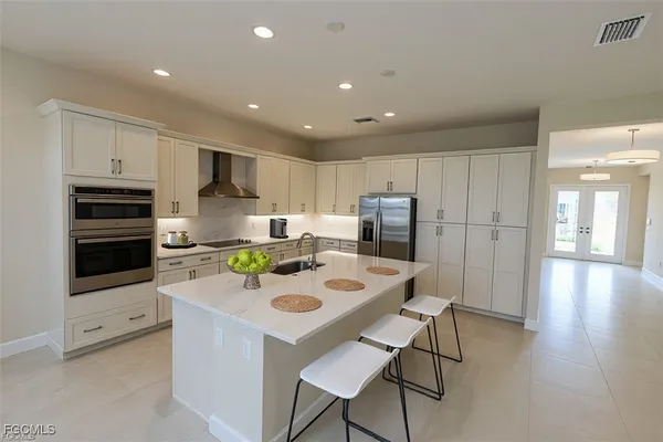 Property Slideshow image 2 of 50 | 14359 hogarth pl, Fort Myers, FL, 33905