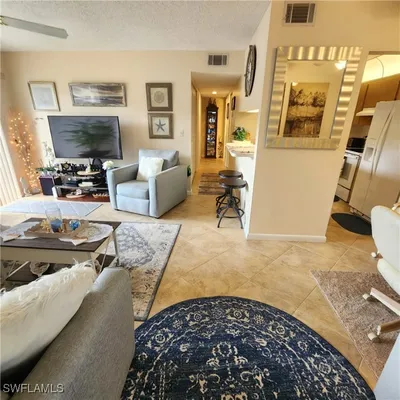 Property Slideshow image 2 of 25 | 9540 green cypress ln # 9-a2, Fort Myers, FL, 33905