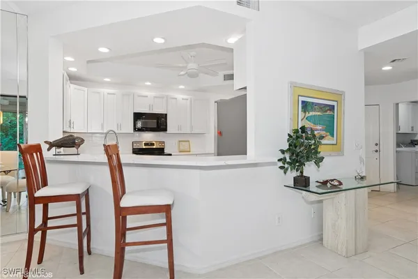Property Slideshow image 3 of 44 | 7048 pelican bay blvd c-105, Naples, FL, 34108