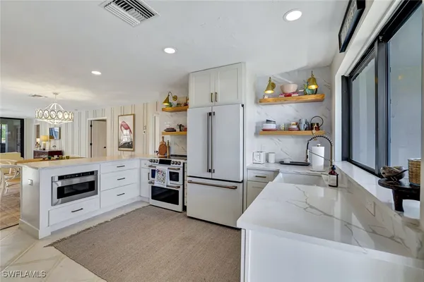 Property Slideshow image 3 of 25 | 3107 riviera dr a-202, Naples, FL, 34103