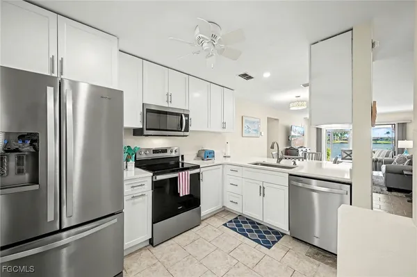 Property Slideshow image 2 of 47 | 11170 caravel cir 104, Fort Myers, FL, 33908