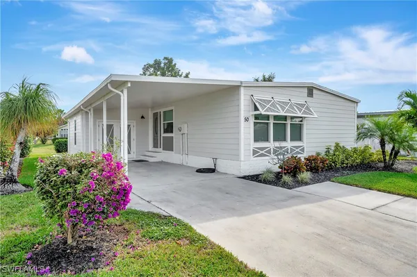 Property Slideshow image 2 of 41 | 50 le mans dr, Naples, FL, 34112