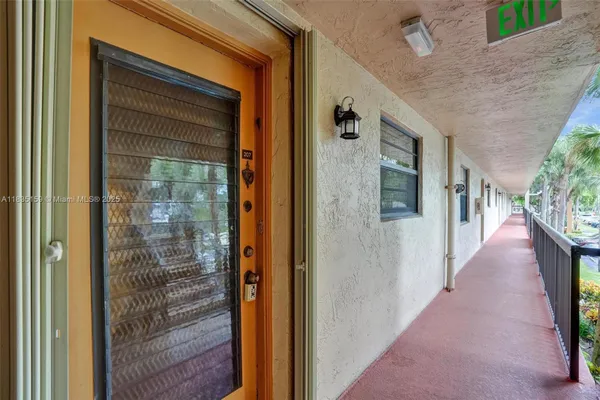Property Slideshow image 2 of 37 | 4965 e sabal palm blvd 207, Tamarac, FL, 33319