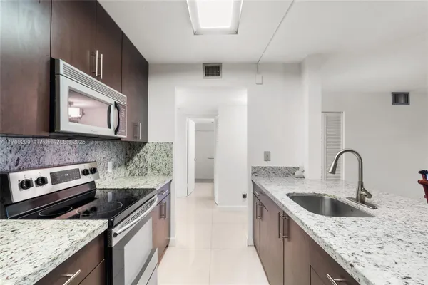 Property Slideshow image 2 of 28 | 12501 sw 14th st apt 108r, Pembroke Pines, FL, 33027