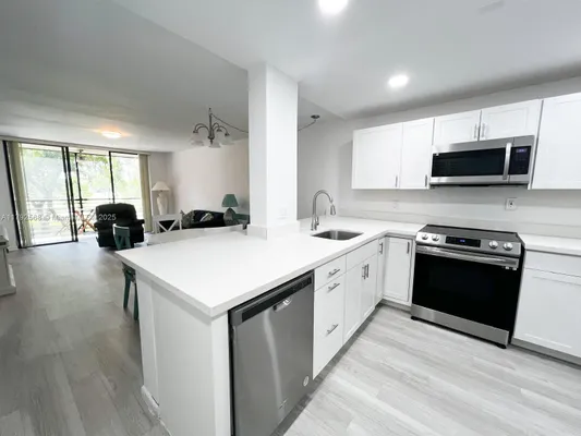 Property Slideshow image 2 of 42 | 7950 w mcnab rd 222, Tamarac, FL, 33321