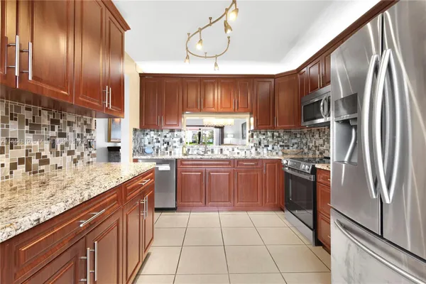 Property Slideshow image 2 of 25 | 12901 sw 15th ct 105v, Pembroke Pines, FL, 33027