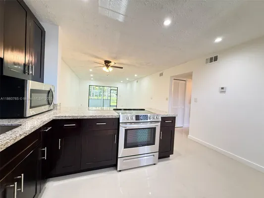 Property Slideshow image 3 of 34 | 6095 n sabal palm blvd apt 103, Tamarac, FL, 33319