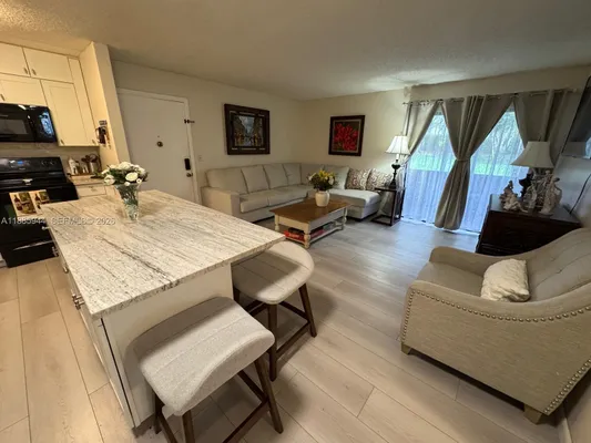 Property Slideshow image 3 of 13 | 10425 e clairmont cir 107, Tamarac, FL, 33321