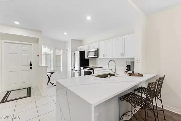 Property Slideshow image 3 of 16 | 9185 celeste dr 204, Naples, FL, 34113