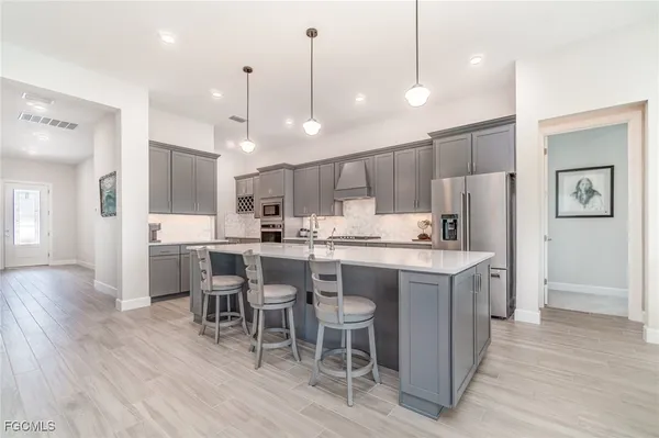 Property Slideshow image 3 of 45 | 17583 winding oak ln, North Fort Myers, FL, 33917