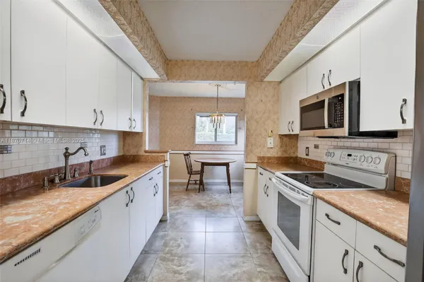 Property Slideshow image 2 of 35 | 13105 sw 16th ct 101l, Pembroke Pines, FL, 33027