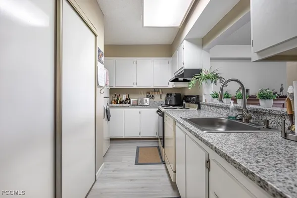 Property Slideshow image 3 of 36 | 7410 lake breeze dr 208, Fort Myers, FL, 33907