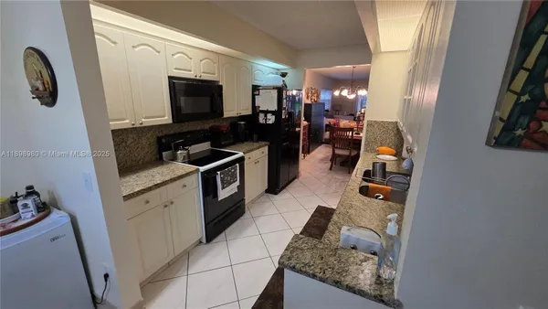 Property Slideshow image 3 of 22 | 12955 sw 16th ct 101m, Pembroke Pines, FL, 33027