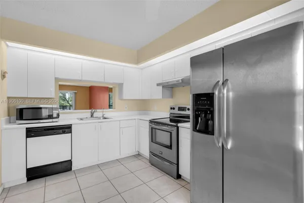 Property Slideshow image 3 of 18 | 550 sw 137th ave 208l, Pembroke Pines, FL, 33027