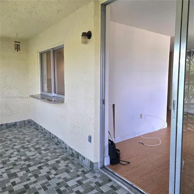 Property Slideshow image 3 of 31 | 9070 lime bay blvd 301, Tamarac, FL, 33321