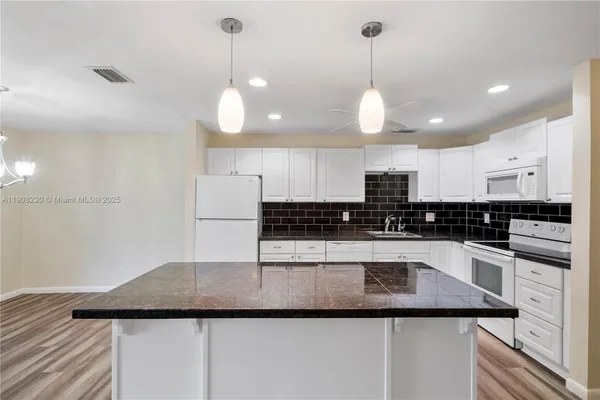 Property Slideshow image 3 of 11 | 1022 nw 88th ave c100, Plantation, FL, 33322