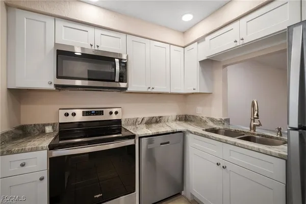 Property Slideshow image 2 of 30 | 1724 pine valley dr 104, Fort Myers, FL, 33907