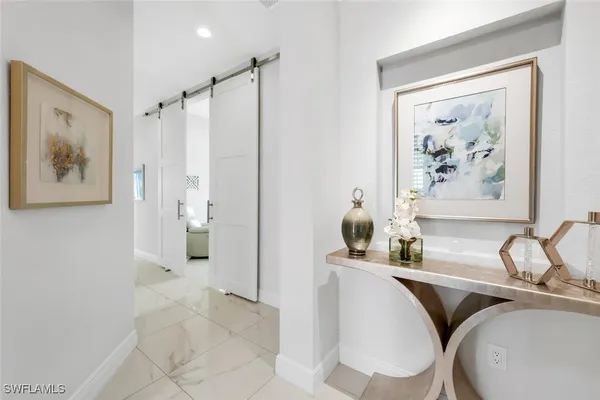 Property Slideshow image 3 of 30 | 605 el camino real unit 102, Naples, FL, 34119