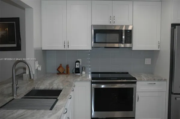 Property Slideshow image 3 of 48 | 3571 inverrary dr 201, Lauderhill, FL, 33319