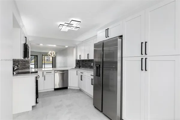 Property Slideshow image 3 of 38 | 7408 fairfax dr 108, Tamarac, FL, 33321