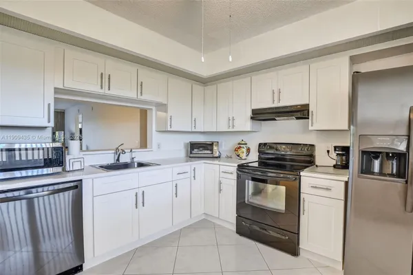 Property Slideshow image 3 of 44 | 13105 sw 16th ct 407l, Pembroke Pines, FL, 33027