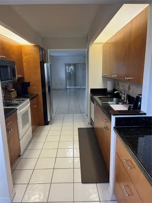 Property Slideshow image 2 of 32 | 1301 sw 142nd ave 301h, Pembroke Pines, FL, 33027