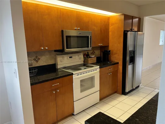 Property Slideshow image 3 of 32 | 1301 sw 142nd ave 301h, Pembroke Pines, FL, 33027