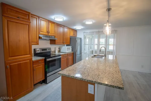 Property Slideshow image 3 of 44 | 5506 virginia dare ln, North Fort Myers, FL, 33917