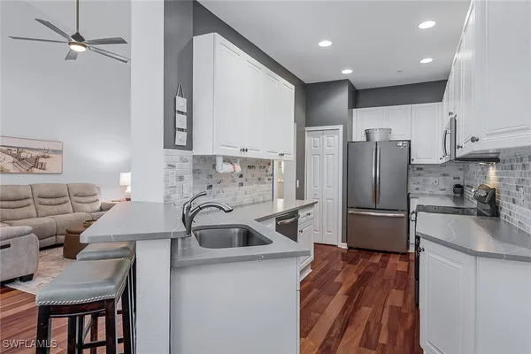 Property Slideshow image 2 of 50 | 3945 deer crossing ct 203, Naples, FL, 34114