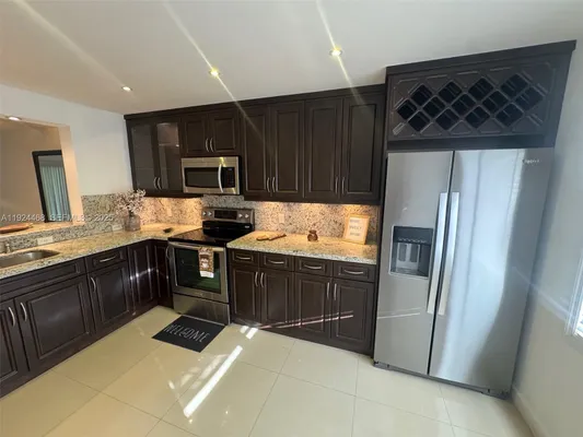 Property Slideshow image 2 of 15 | 13001 sw 15th ct 207t, Pembroke Pines, FL, 33027