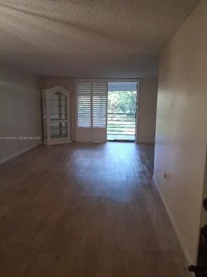 Property Slideshow image 3 of 29 | 900 st charles pl 208, Pembroke Pines, FL, 33026