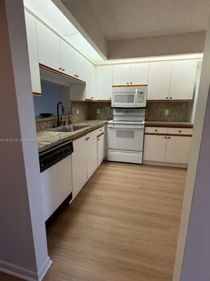 Property Slideshow image 3 of 26 | 1401 sw 128th ter 205h, Pembroke Pines, FL, 33027