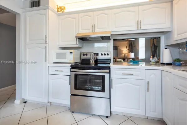 Property Slideshow image 3 of 25 | 4940 e sabal palm blvd 414, Tamarac, FL, 33319