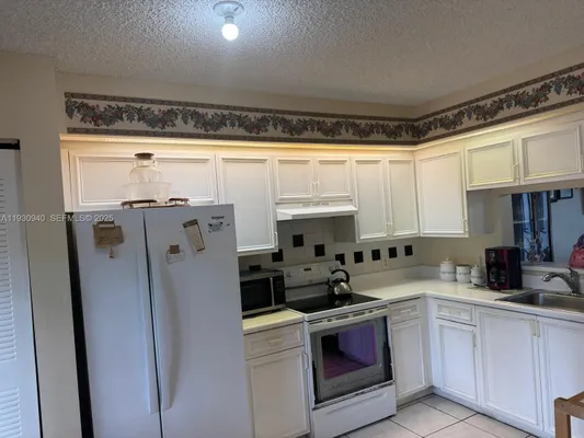 Property Slideshow image 2 of 23 | 1351 sw 141st ave 205g, Pembroke Pines, FL, 33027