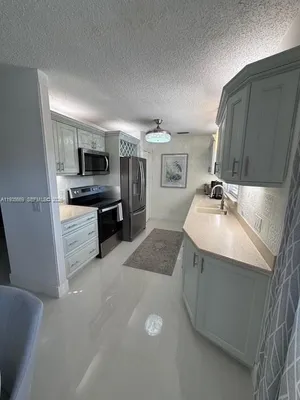 Property Slideshow image 2 of 35 | 17 lake vista trl apt 201, Port Saint Lucie, FL, 34952